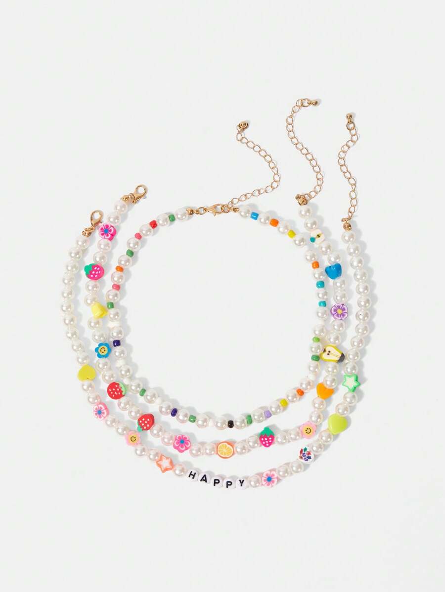 SHEIN ICON Conjunto de Colares Trançados Mistos de Pérolas Falsas com Frutas e Flores (Cor dos Contas Aleatoriamente Sortida)