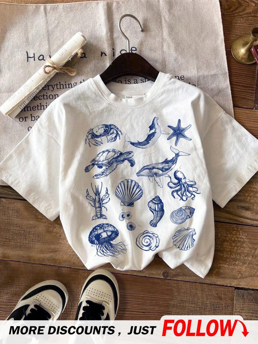 SHEIN Camiseta de manga corta de cuello redondo con estampado de criaturas marinas de dibujos animados casual y sencilla para niños jóvenes, adecuada para el verano