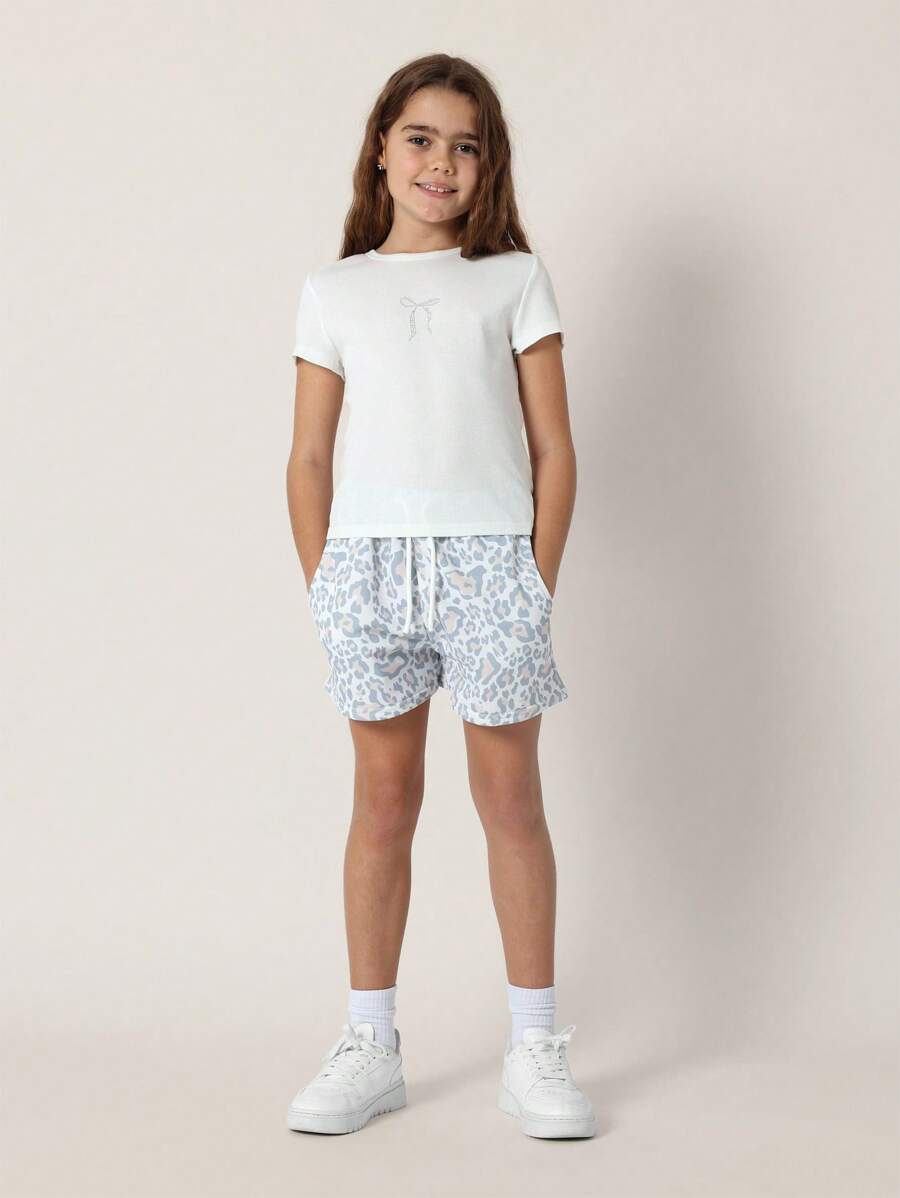 SUMWON Conjunto casual de verano para niñas pre-adolescentes con camiseta de bebé con estampado de leopardo y pantalones cortos deportivos a juego, conjunto de prendas de estar en casa perfecto para actividades de primavera y verano