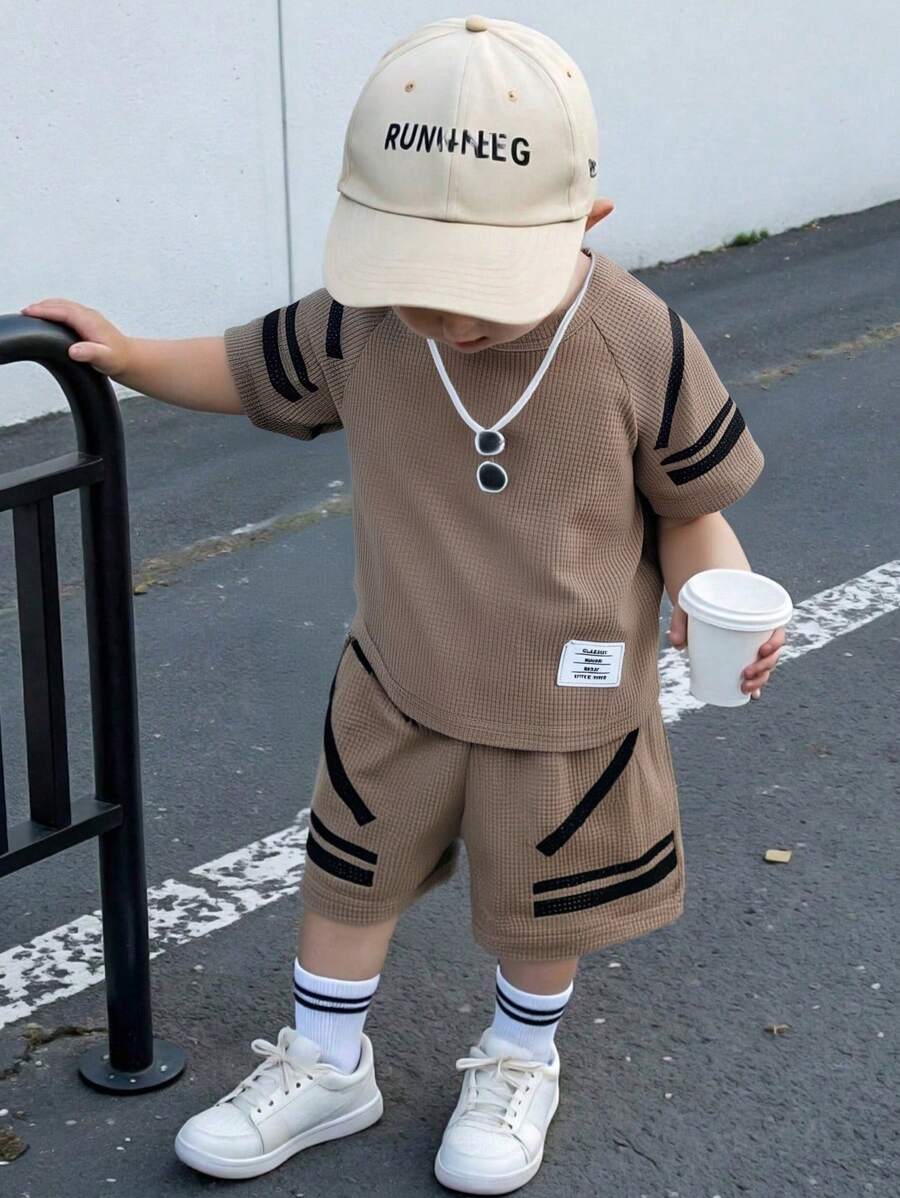 SHEIN Tenue complète pour bébé garçon, t-shirt à manches raglan avec imprimé simple et short, adapté pour l'été, idéal pour