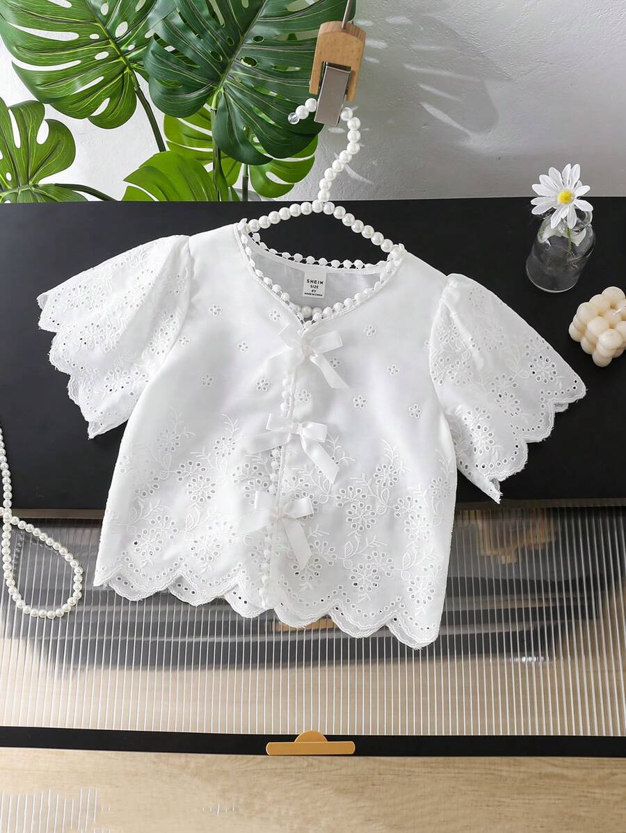 SHEIN Blusa de manga corta de color liso y de moda, adecuada para el verano, para niña joven