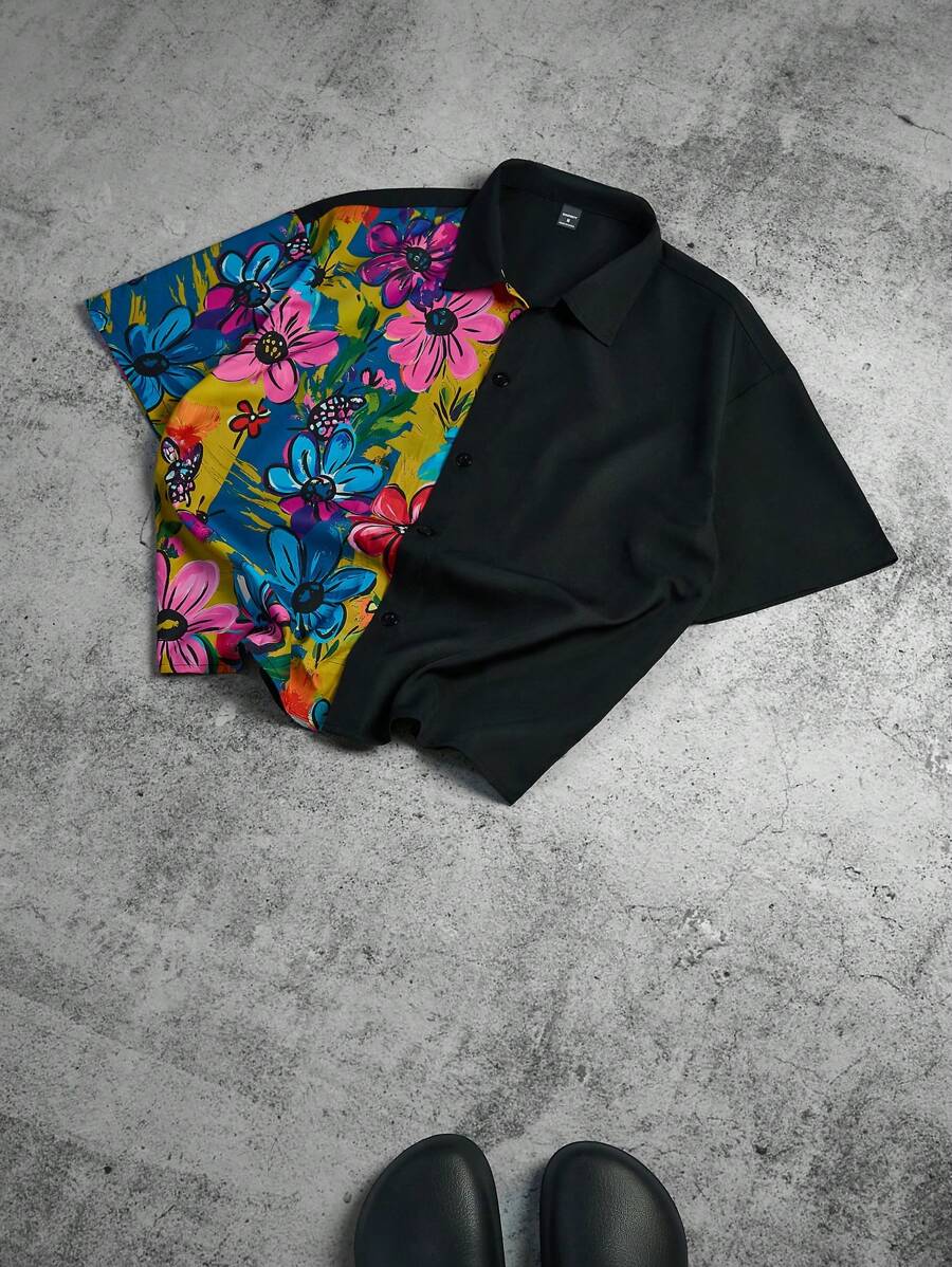 Manfinity Hypemode Camisa casual de manga corta negra con estampado floral y grafiti colorido en la parte delantera para hombres