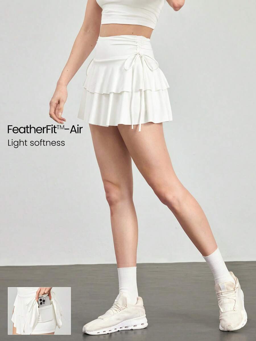 GLOWMODE 4" Mini gonna con lacci laterali FeatherFit™-Air, asciugatura rapida, con tasche laterali e fondo antiscivolo, adatta per tennis, golf, yoga, pilates, uso quotidiano e casual