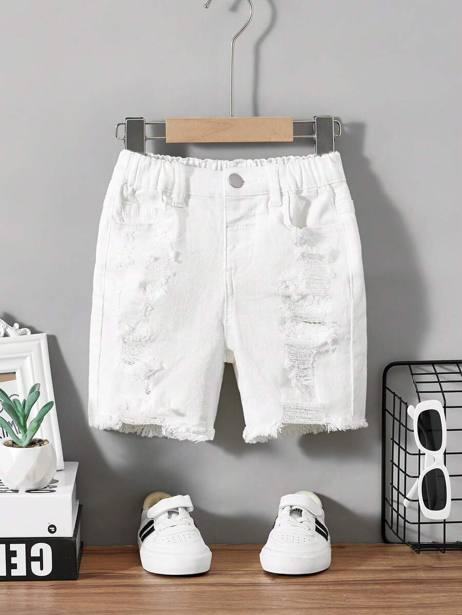 SHEIN Pantalones cortos de niño con diseño desgarrado de color liso
