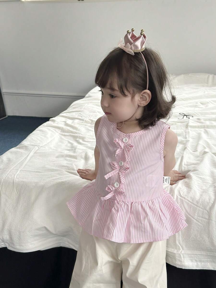 SHEIN Vintaside Kids Blusa informal elegante sin mangas para bebé/niña pequeña a rayas rosadas y blancas con moño