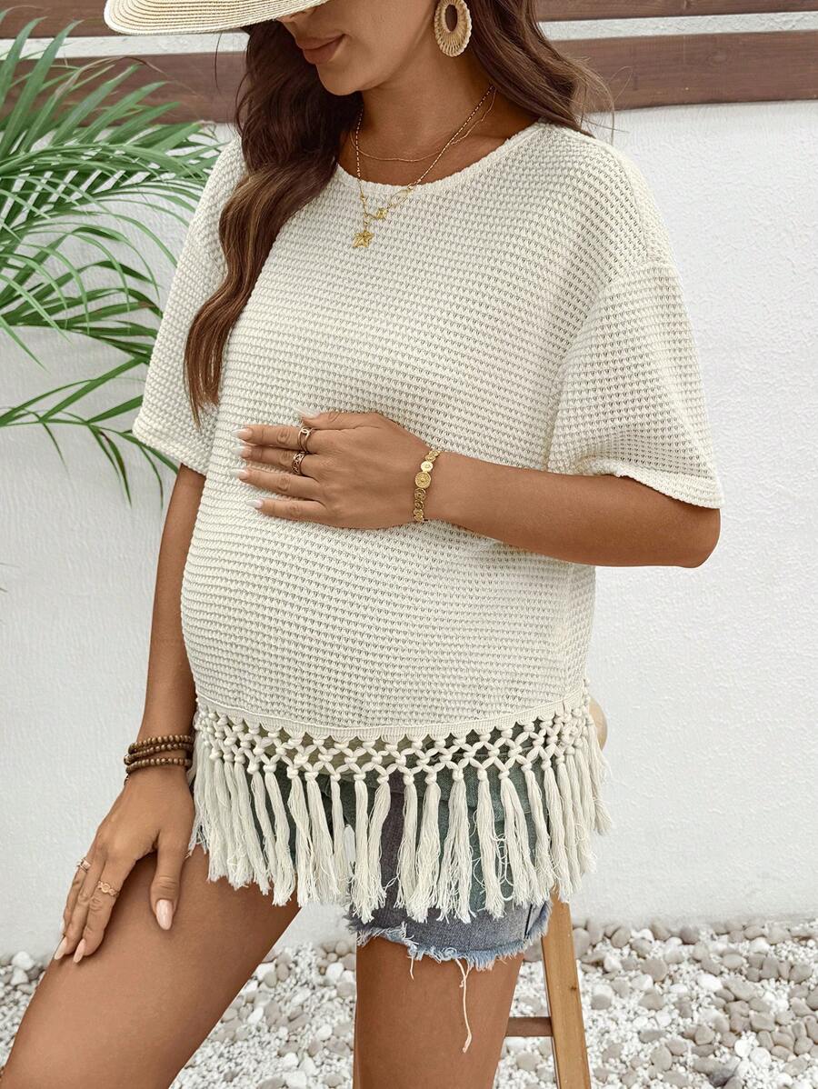 SHEIN Camiseta casual de embarazo holgada con dobladillo con flecos y cuello redondo de un solo color