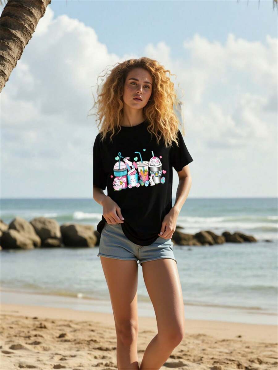 Mulvari Camiseta de mujer de cuello redondo de manga corta, versátil y casual, con estampado gráfico de bebida fresca, en color negro, adecuada para Pascua, uso diario, salidas, citas, ocio, fiestas y vacaciones. Parte superior de primavera, primavera/verano