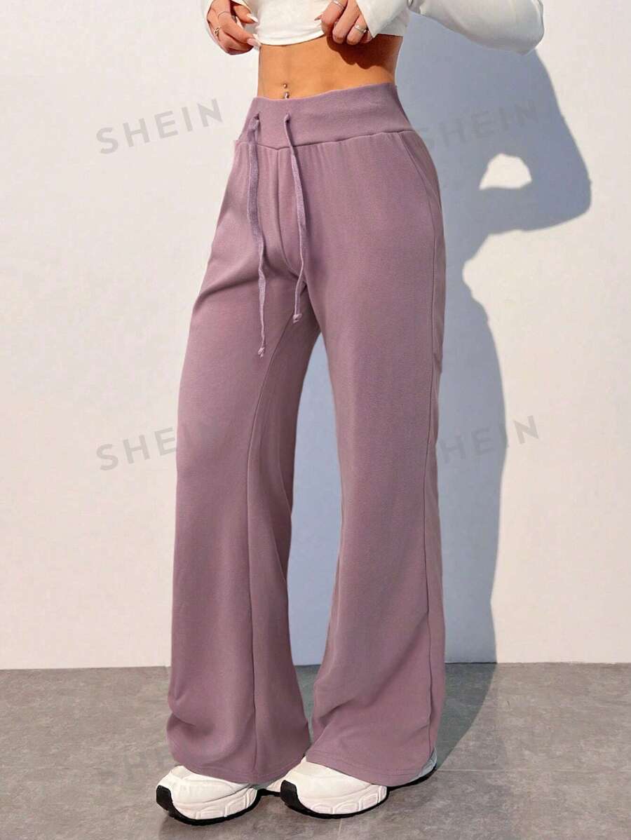 SHEIN EZwear Pantalones casuales ligeros lisos para mujeres, adecuados para el verano