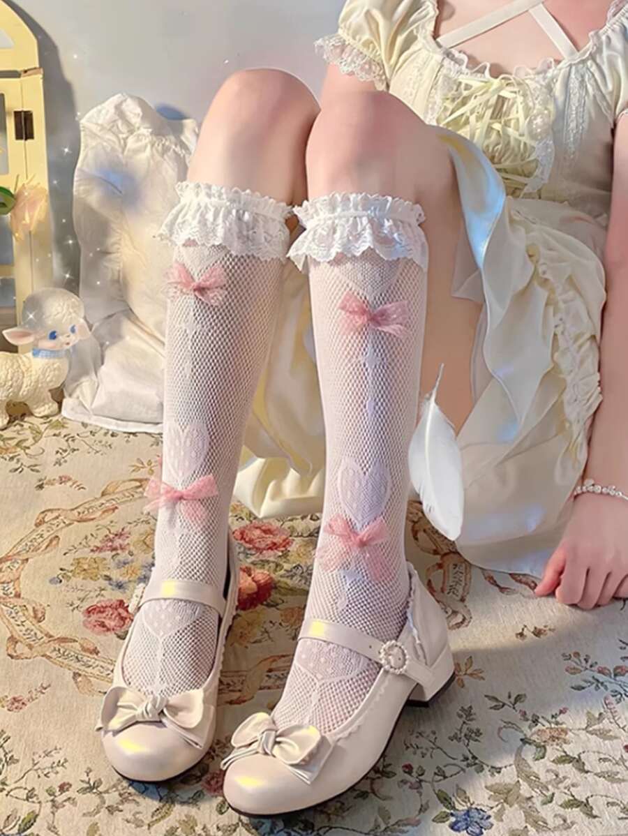 1 par de mujeres Calcetines dulce estilo dulce caramelo chupete & con diseño de lazo rodilla Calcetines de tubo para mujeres