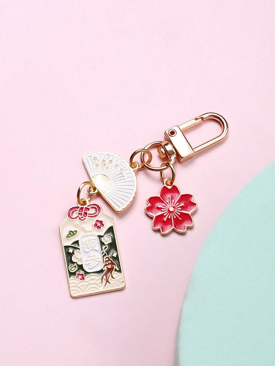 Colgante para bolso con diseño de flor y abanico plegable, accesorio adorable estilo japonés para llavero, colgante de llavero, amuleto de Feng Shui con flor japonesa para la salud, educación, seguridad y riqueza, accesorios de coche, llavero de mujer, insignia de esmalte, regalos de agradecimiento para maestros