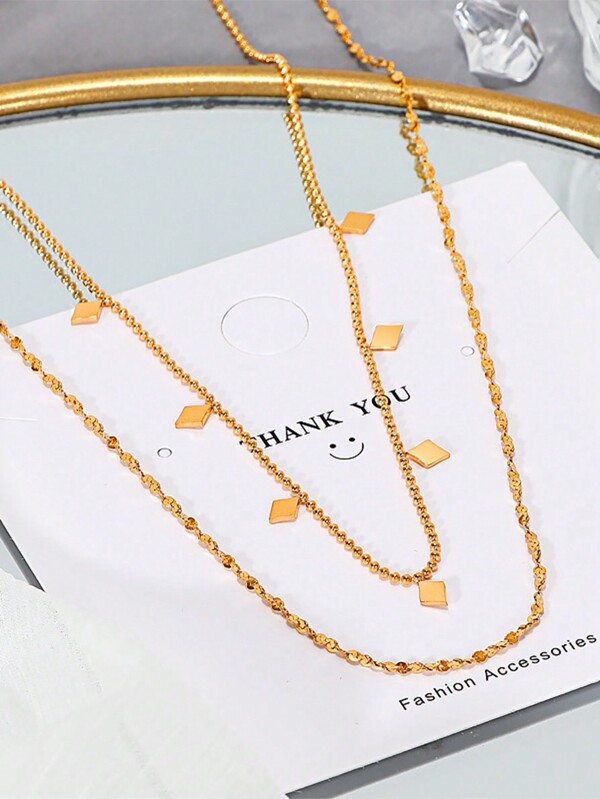 A Simple & Elegant DoubleLayered 18k Gold Plated Necklace, Adorned With Multiple Small Square