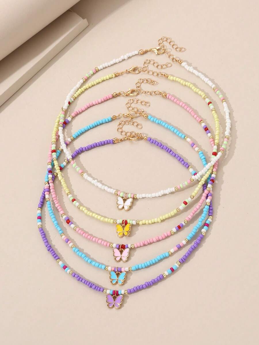 Set de 5 collares con cuentas con forma de corazón y flor para niñas