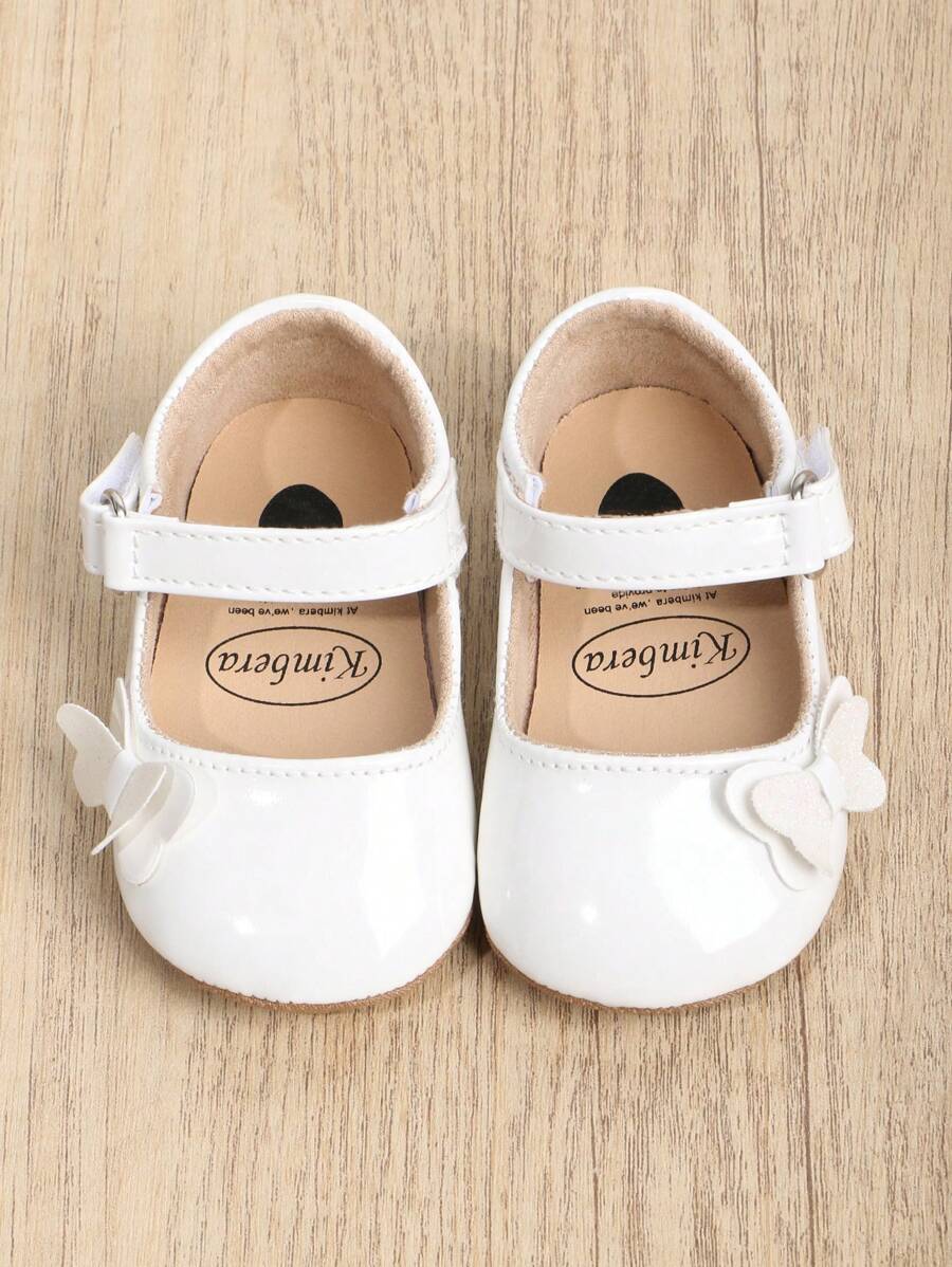 1 coppia Scarpe PU per bambine, con nodo a fiocco di colore solido, chiusura a gancio e anello, suola morbida antiscivolo adatta per bambini da 0-18 mesi, stile principessa elegante e atmosferico, perfetto per la stagione primavera e autunno