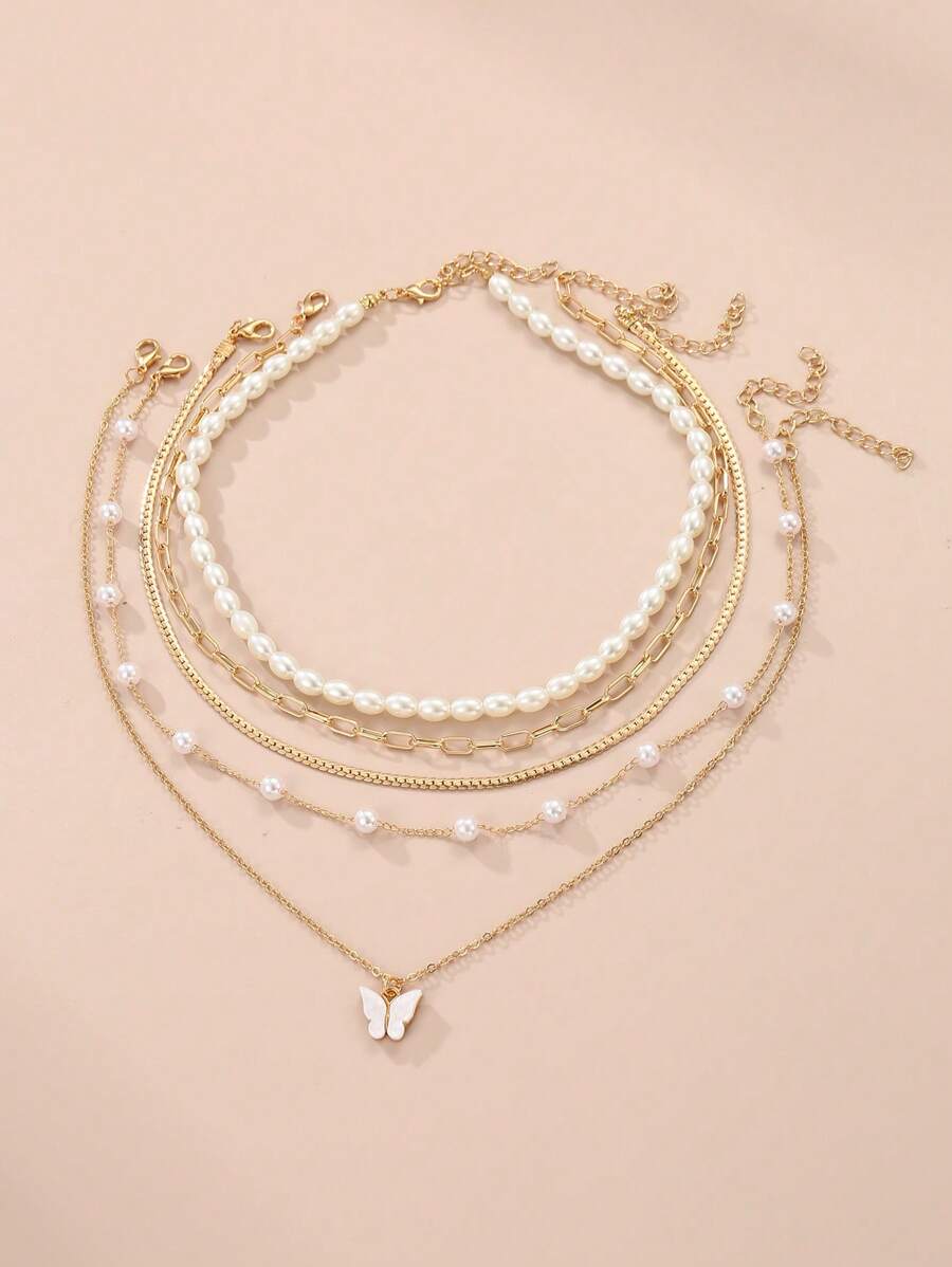 Set di 5 collane finte con perle a forma di farfalla per bambini, carine, bianche