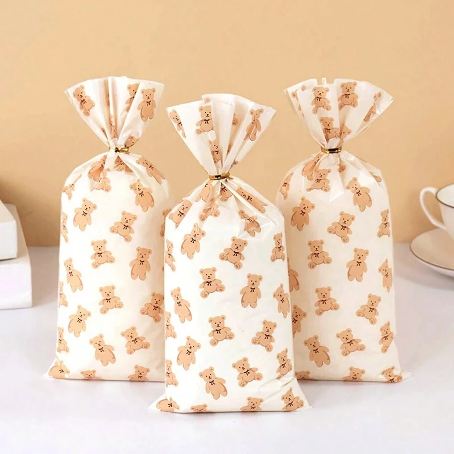 Set de 50 piezas/100 piezas Bolsas de plástico para empacar regalos de dulces de oso, galletas, postres, suministros de decoración para fiesta de cumpleaños, baby shower