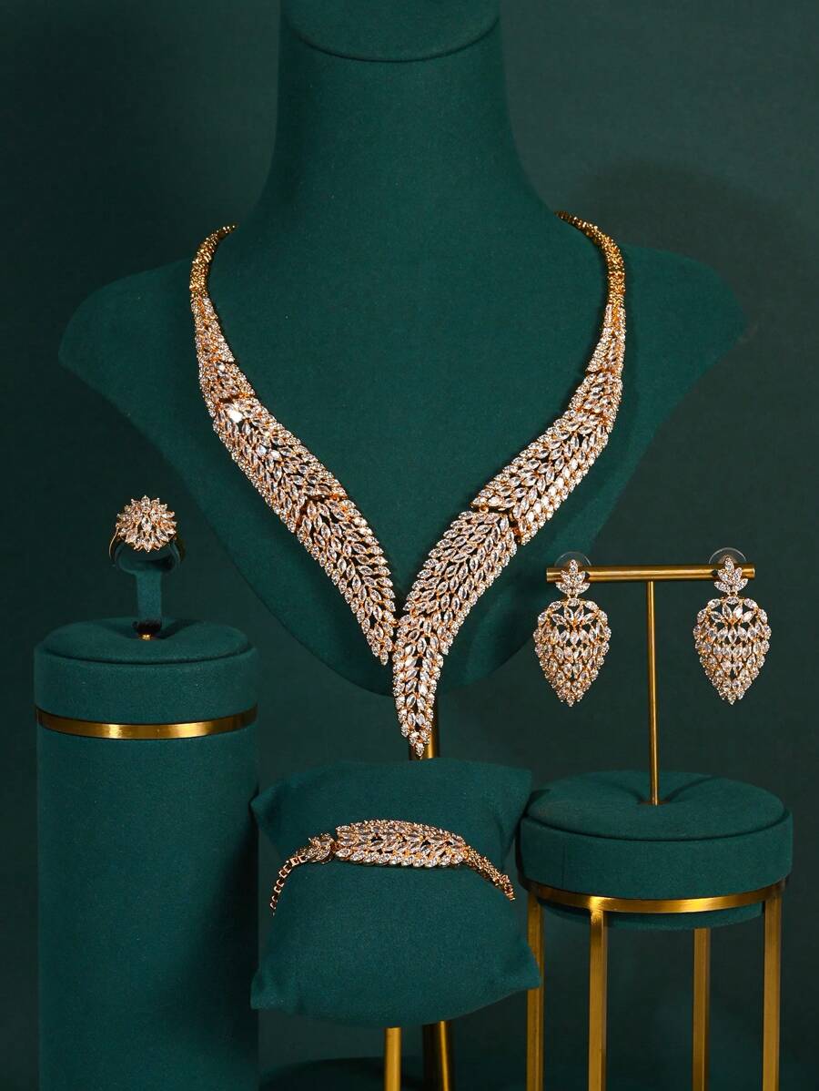 4 pièces/set Ensemble de bijoux de luxe pour femmes avec zirconium cubique incrusté micro. Comprend un collier, des boucles d'oreilles, une bague et un bracelet. Parfait pour les occasions formelles, les mariages et comme cadeau pour la Saint-Valentin, la mère, la fête des mères.