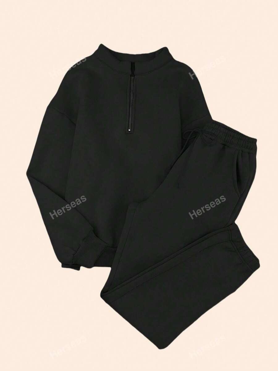 Tuta 2 pezzi felpata oversize con cerniera sotto, maglia con maniche lunghe a spalla cadente e pantaloni felpati con tasche, completo tuta