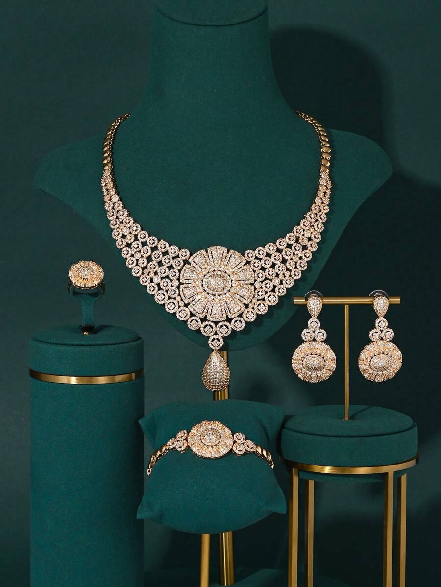 4 pièces/set Ensemble de bijoux de luxe haut de gamme comprenant un collier, un bracelet, des boucles d'oreilles et une bague avec des pendentifs en forme de larme en zircone plaqués or. Accessoires de robe de mariée et de fête. Cadeau fastueux pour la Saint-Valentin.