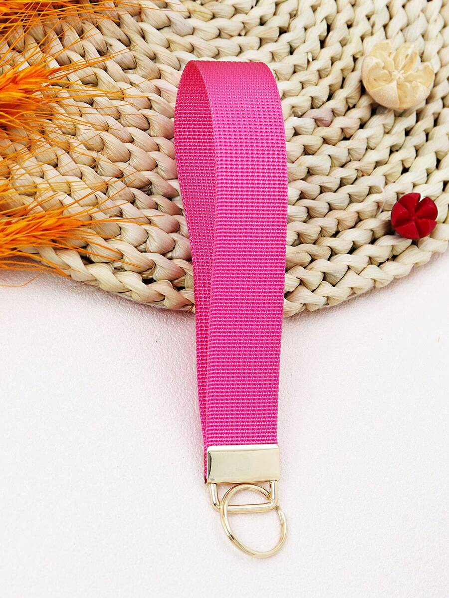 1 pièce Porte-clés de poignet rose avec lanière pour clés, porte-clés avec anneau de clé, sangle courte mignonne pour porte-cartes d'identité, portefeuille, téléphone portable, accessoires de porte-clés à la mode, excellent cadeau pour femmes, épouse, petite amie, et amie intime.