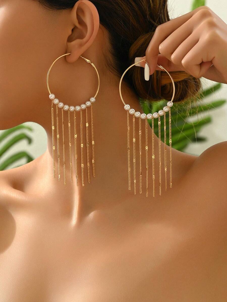 1 paar elegante ronde creolen met kwastversiering