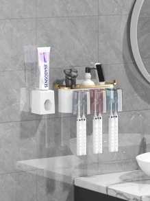 three mouth cup with toothpaste squeezer