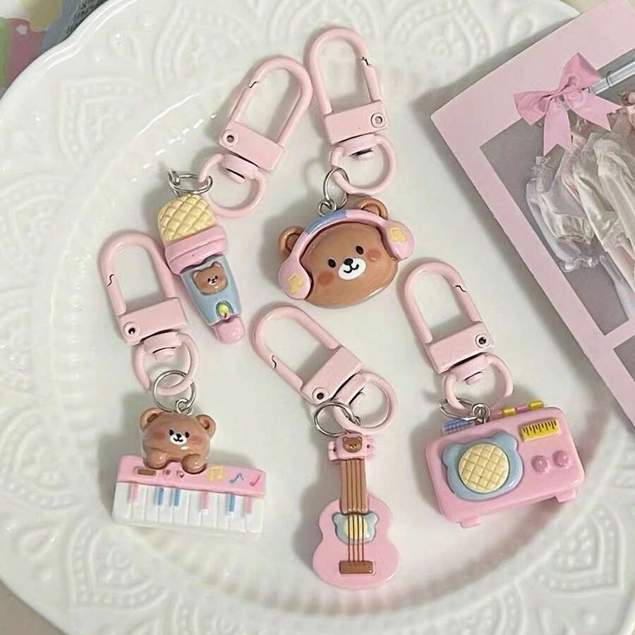 5 piezas Llaveros de osito musical rosa, lindos regalos con colgantes de bolso de dibujos animados para amigos, accesorios para coche, encantos para mochilas escolares