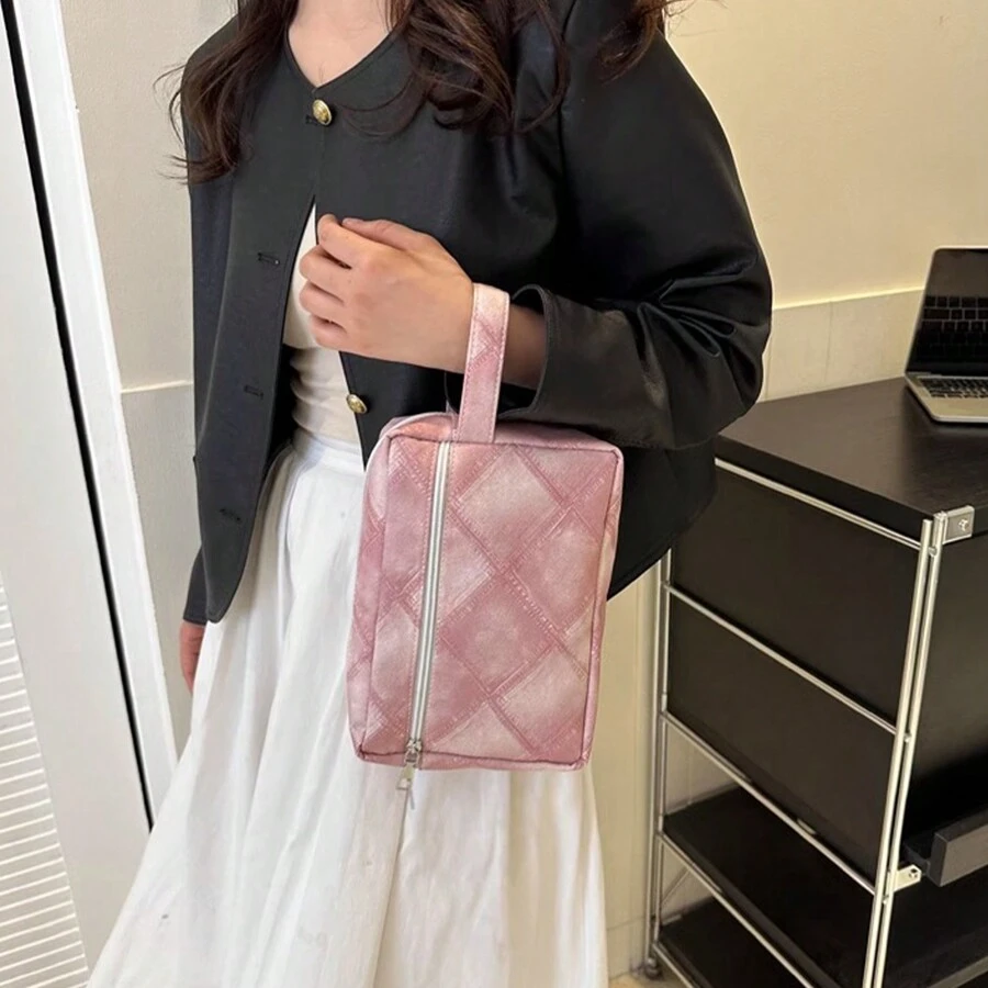 Un sac de maquillage portable haute gamme de grande capacité, sac de rangement imperméable pour cosmétiques