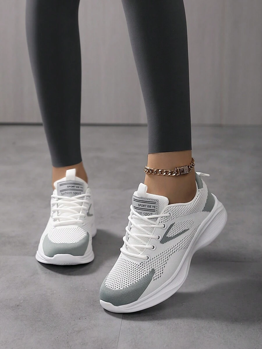 Baskets décontractées mode femme - respirantes et confortables, chaussures de course basses à lacets avec design rayé, polyvalentes pour toutes les saisons, disponibles en blanc/vert, rose clair/bleu, noir/blanc et bleu foncé/noir