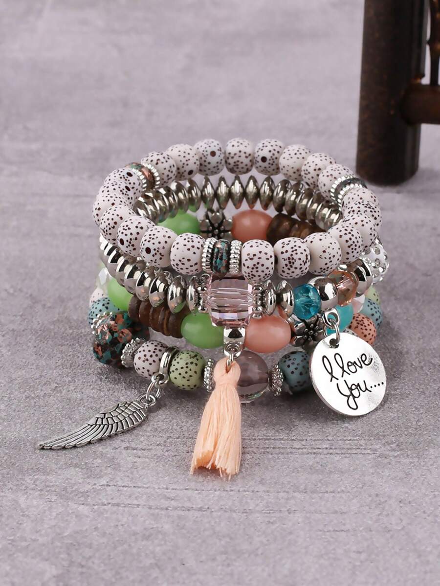 4 Stück Set Armreifen im Boho-Stil mit Quastenanhänger und Flügelscheibe, modischer Armschmuck für Frauen