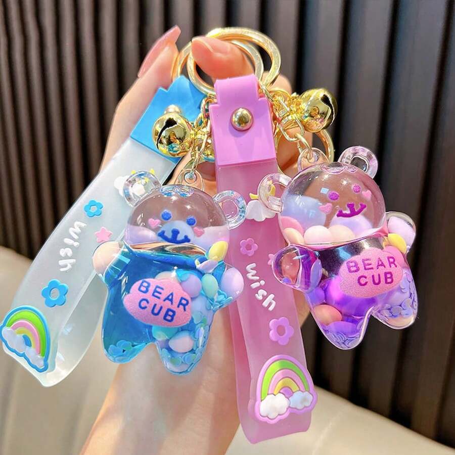 1 pièce Porte-clés créatif en forme d'ours bonbon jelly avec cloche, porte-clés mignon rempli de liquide, convient pour un usage quotidien ou comme cadeau de couple, accessoire de voiture, charm de sac, sac à dos pour l'école