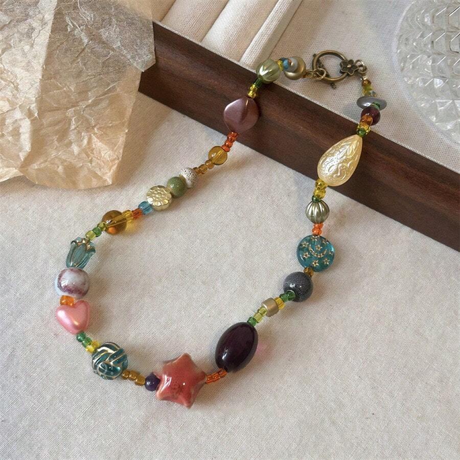 1 pieza Collar con cuentas de vidrio de arroz, estrella de cerámica y acrílico de diseño encantador y colorido - Collar gargantilla elegante para mujer, adecuado para viajes, uso diario y regalo de cumpleaños