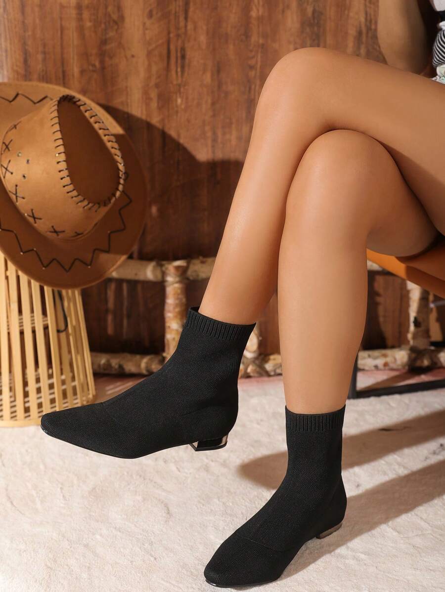 Black Sock-Covered Mid-Calf Boots With Small Square Toe And Flat Heels. Comfortable And Lightweight For Daily Wear. Fashionable And