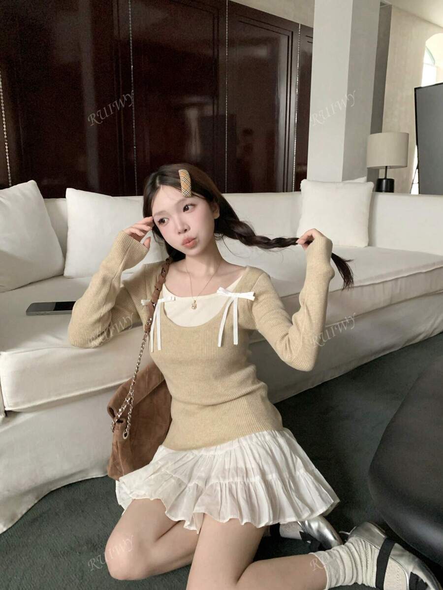 RUIWY Women's Sweet Bowknot Designed Colorblock Long Sleeved Slim Fitted Sweater Round Neck Pullover Top For Autumn