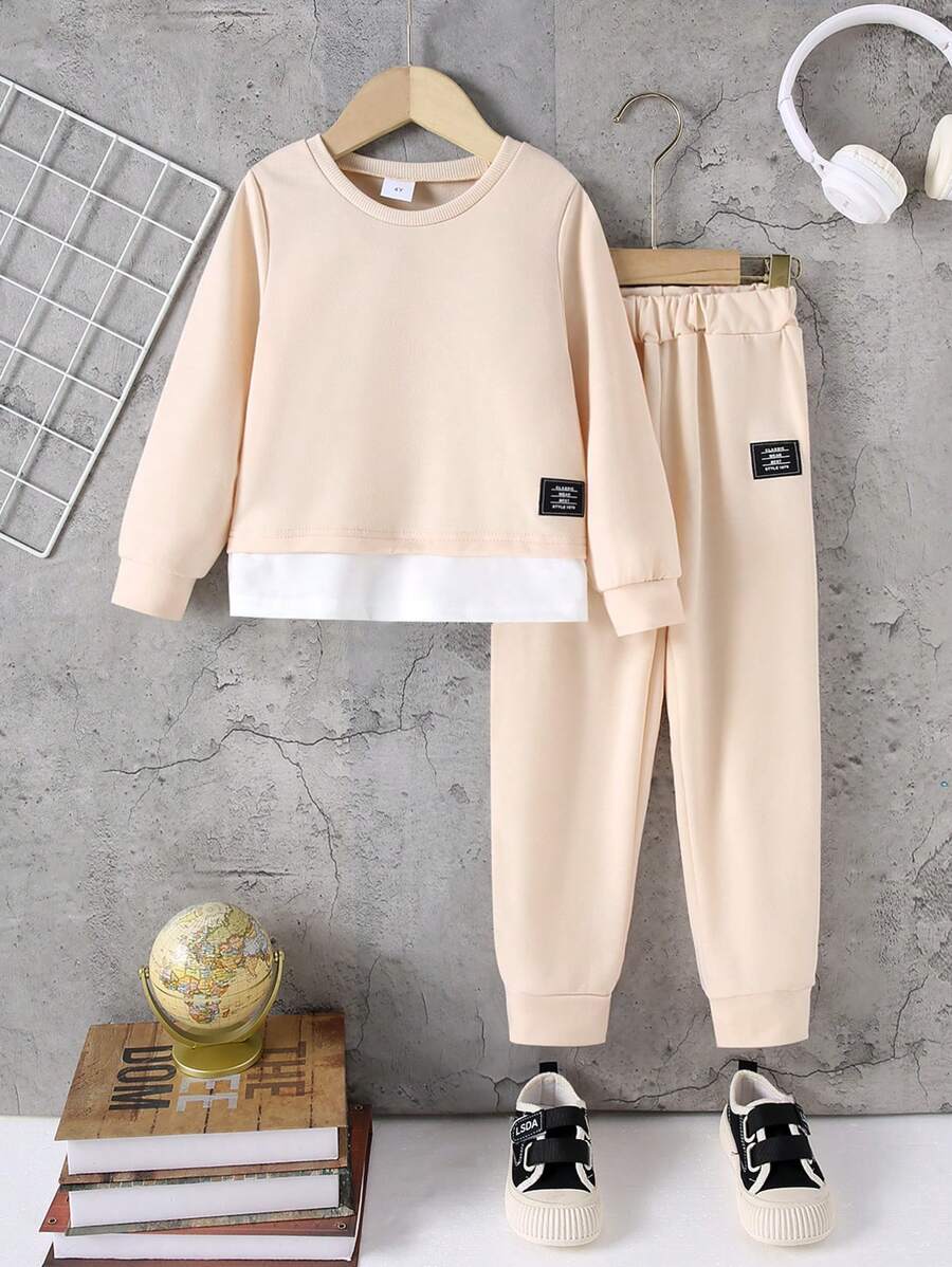 2 pièces/set Ensemble 2 en 1 de pull col rond et pantalon en couleur unie avec détail brodé, style décontracté pour filles, automne/hiver