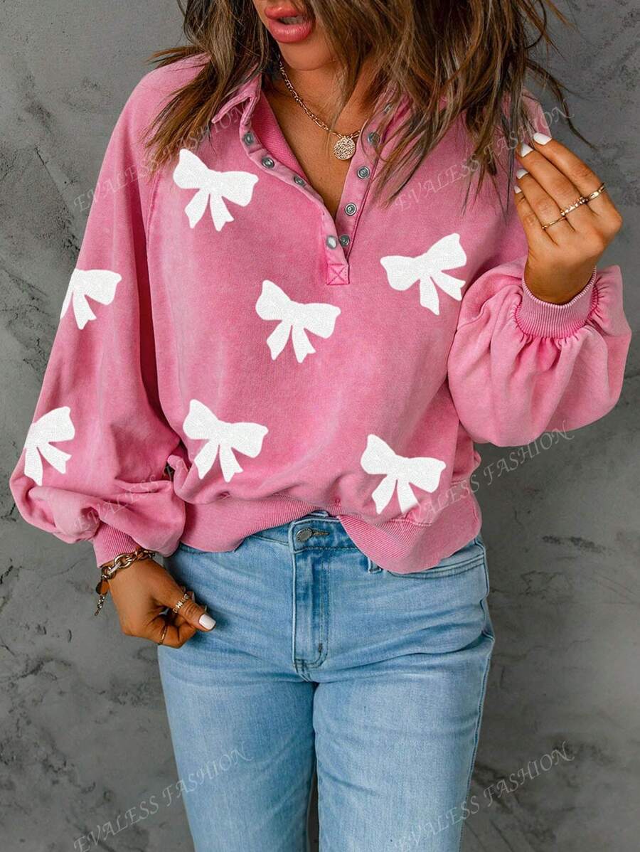 Sweatshirt à manches tombantes avec demi-boutons, nœud papillon et séquins