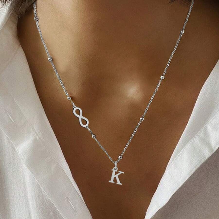 1 pièce Simple Collier avec pendentif en forme de symbole infini et initiale en acier inoxydable couleur argent pour femmes