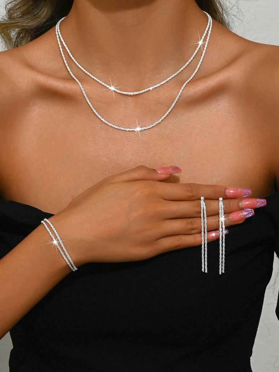 Ensemble de bijoux à la mode et luxueux, composé d'une chaîne de clavicule, de boucles d'oreilles, d'un collier et d'un bracelet, idéal pour un usage quotidien, un mariage, un banquet ou une fête.