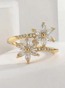 Mit Gold eingelegte weiße Zirkonia-Steine