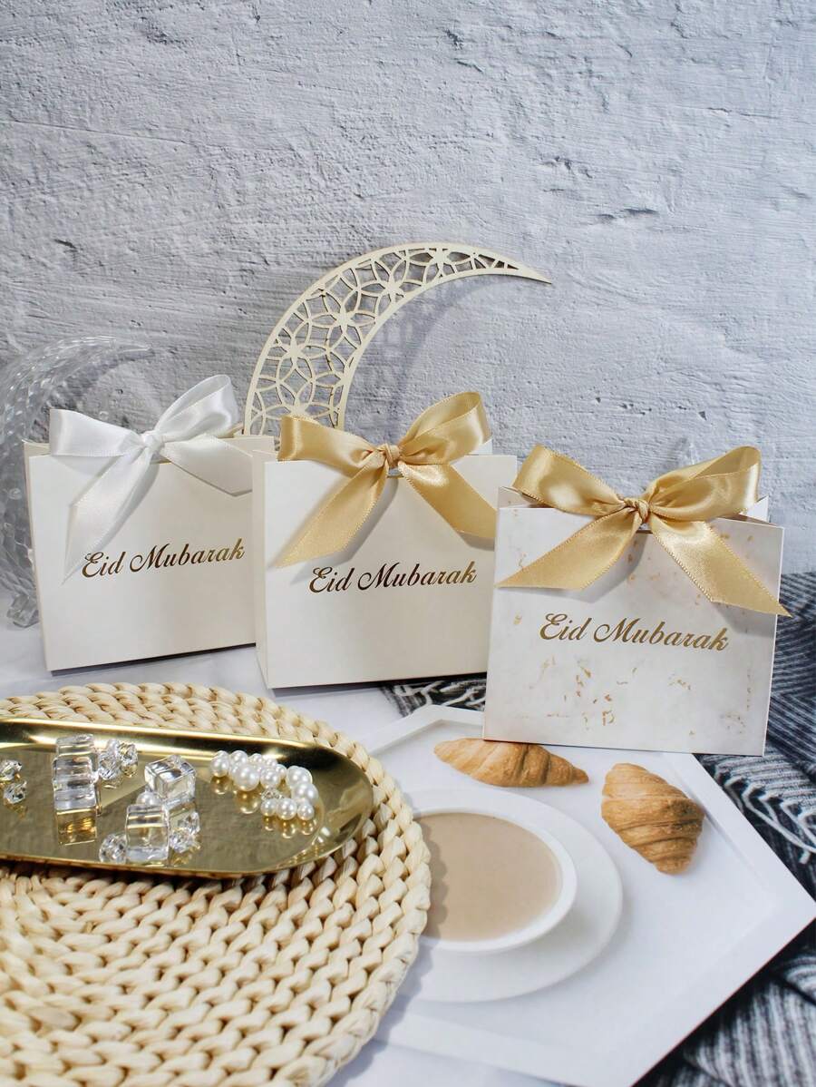 10pcs Elegant Eid Mubarak Mini Gift Boxes Stylish White Favor Boxes With Gold Foil Lettering And Delicate Ribbons. Perfect For Storing Candies, Chocolates, And Small Gifts. Ideal For Eid Celebrations, Festive Occasions, And Thoughtful Surprises. Chic Packaging For Memorable Moments