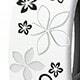 Blanco con flores negras.