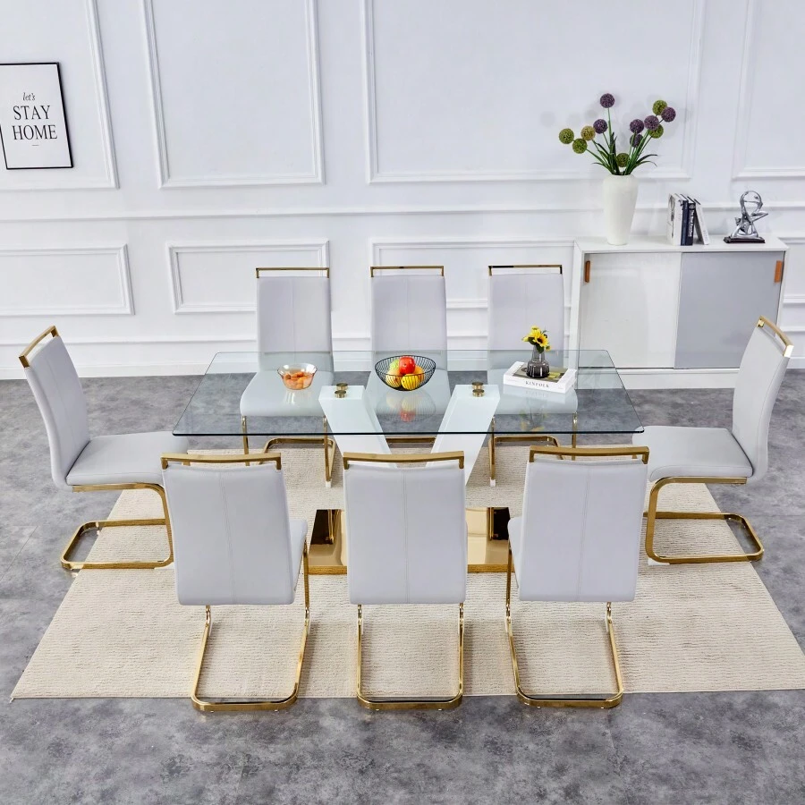 Table And Chair Set.Subtle Luxury Clear Tempered Glass Dining Set - 71"X35.4" With 8 Light Gray PU Chairs.C-Tube Gold Metal Chair Legs.Bring A Comfortable Home Experience To The Kitchen Bedroom.