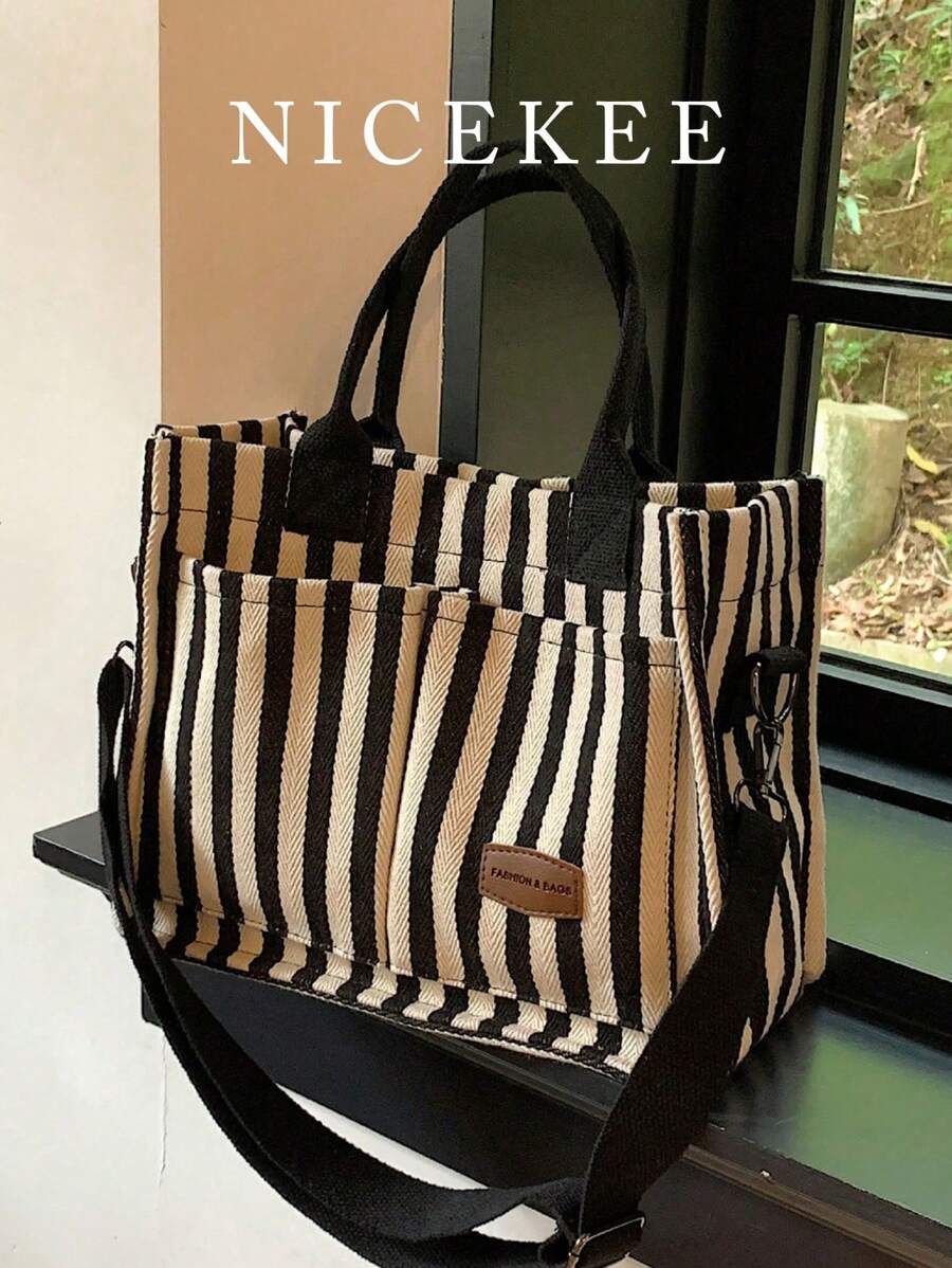 Bolso de hombro informal de rayas verticales versátil para mujer, para cartera y bolsa de mano, bolso grande para diario de lienzo con múltiples bolsillos y gran capacidad. Ligero bolso mensajero casual y de hombro, minimalista, para computadora portátil y deporte con múltiples compartimentos y bolsillos para estudiantes universitarias y adolescentes. Perfecto para la oficina, la universidad, la escuela secundaria, el trabajo, los negocios y el traslado.