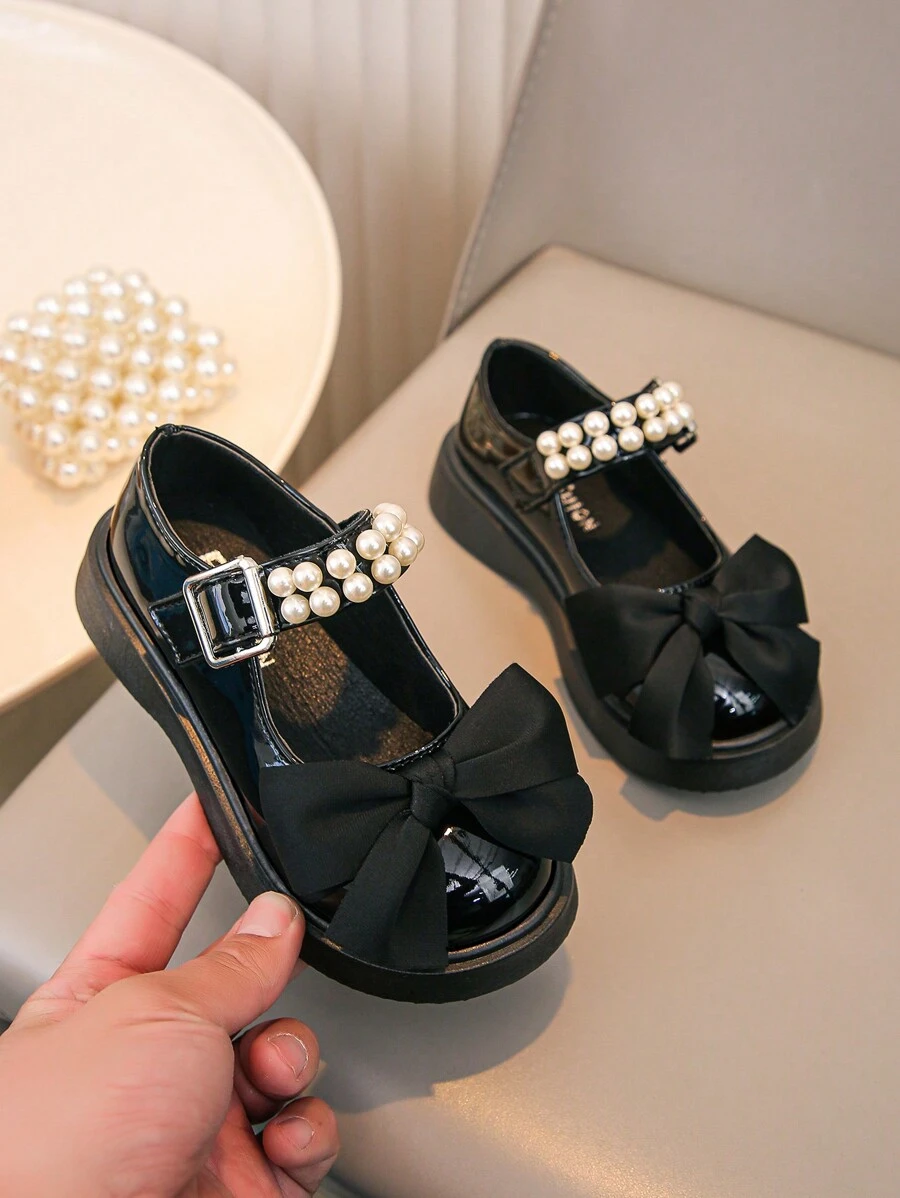Mädchen glänzende schwarze Schleifen Dekor Mode niedliche flache Loferschuhe, weich und bequem