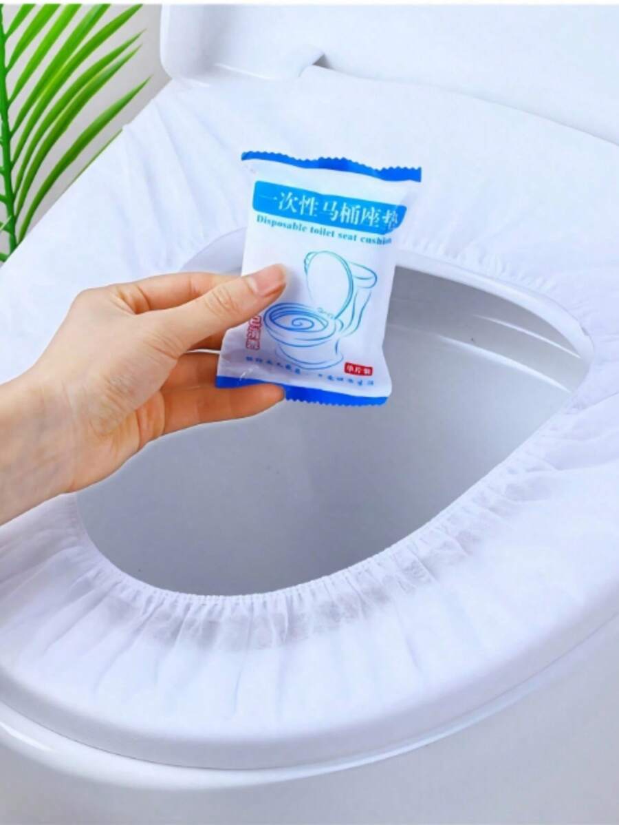 50 Stück Einweg-Toilettendeckel, einzeln verpackte Toilettensitzauflagen, tragbare Reise-Geschäfts-Toilettenmatten, Reisezubehör für öffentliche Toiletten, Flugzeug, Camping, tragbare Einweg-Toilettenauflage für den Haushalt, hochwertige elastische Gürtel-Toilettendeckel, tragbare wasserdichte und schmutzabweisende Toilettensitzauflagen, rutschfeste Reise-Toilettensitzabdeckungen für Zuhause, Jugendgeschenke - Vliesstoff