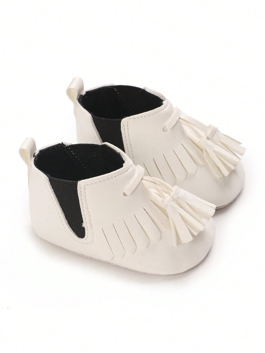 Botas de unicolor cálidas de alta caña con borlas, versátiles para niños pequeños, otoño/invierno