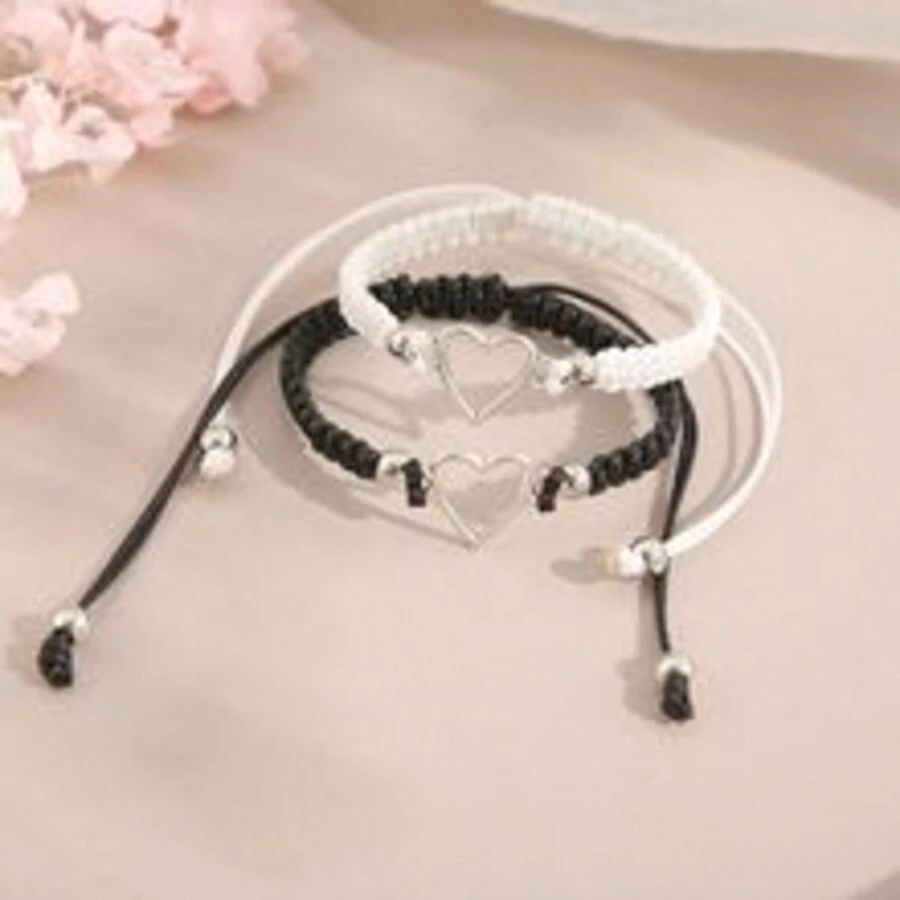 2 pièces Nouveau bracelet vague créative pour couple, noir et blanc, bracelet creux tressé avec système de fermeture ajustable. Cadeau amical pour sœurs, idéal pour la remise des diplômes, Halloween, la Saint-Valentin, la fête des mères