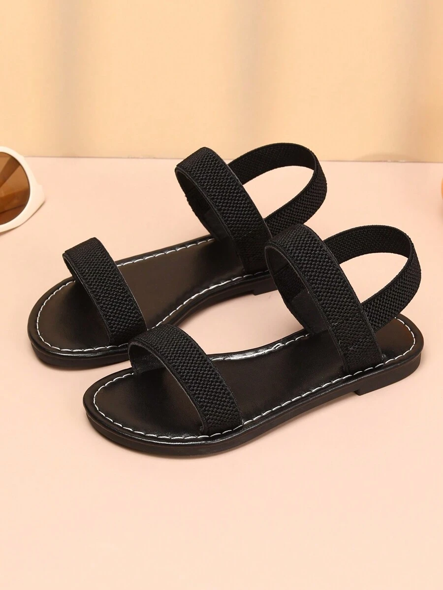 1 paar meisjes eenvoudige effen zwarte casual sandalen, zachte en comfortabele stoffen bandjes met TPR-zool, verstelbare dubbele elastische banden, platte hak, geschikt voor school, reizen en dagelijks gebruik