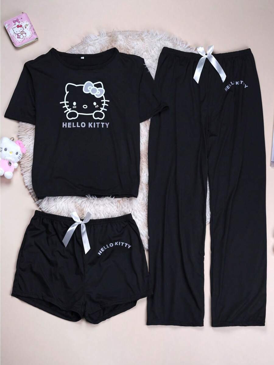 Sanrio Conjunto de tres piezas de pijama de verano para mujer autorizado por Sanrio con top de manga corta, shorts y pantalones estampados con diseño de KT de estilo suelto y casual, elegante para el hogar y de vacaciones