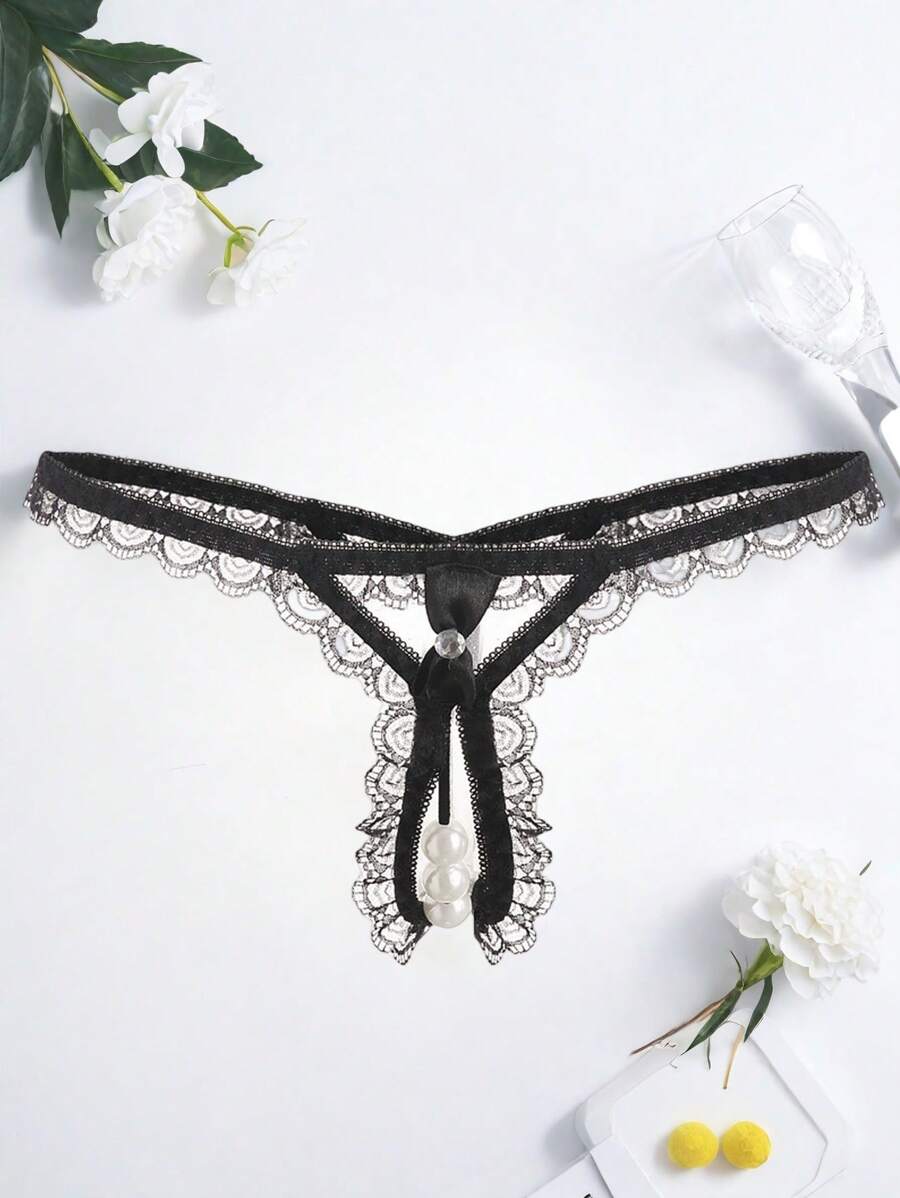 Lencería sexy ropa interior transparente de encaje con aberturas y cuentas grandes, diseño seductor y de moda