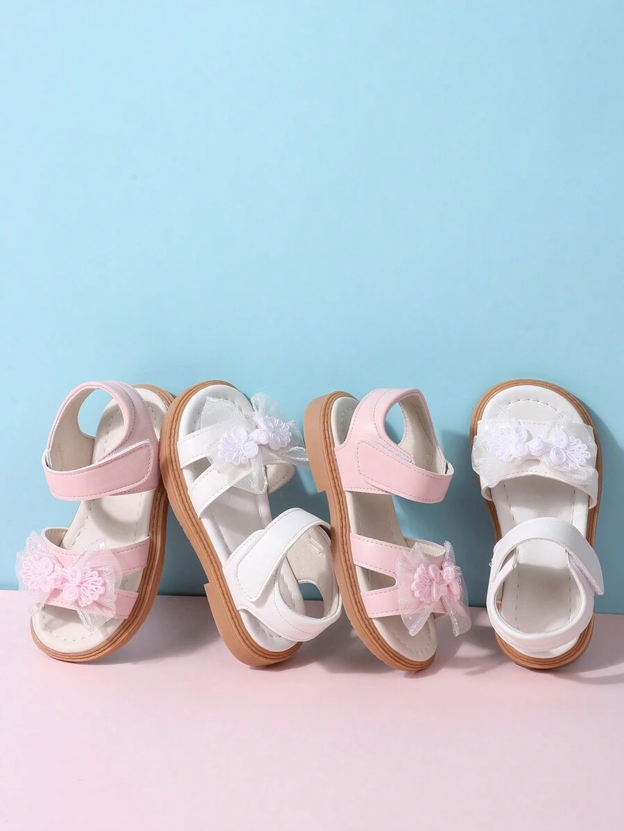 Sandalias planas de encaje para niñas del verano 2025, sandalias cómodas antideslizantes con lazo para bebé princesa